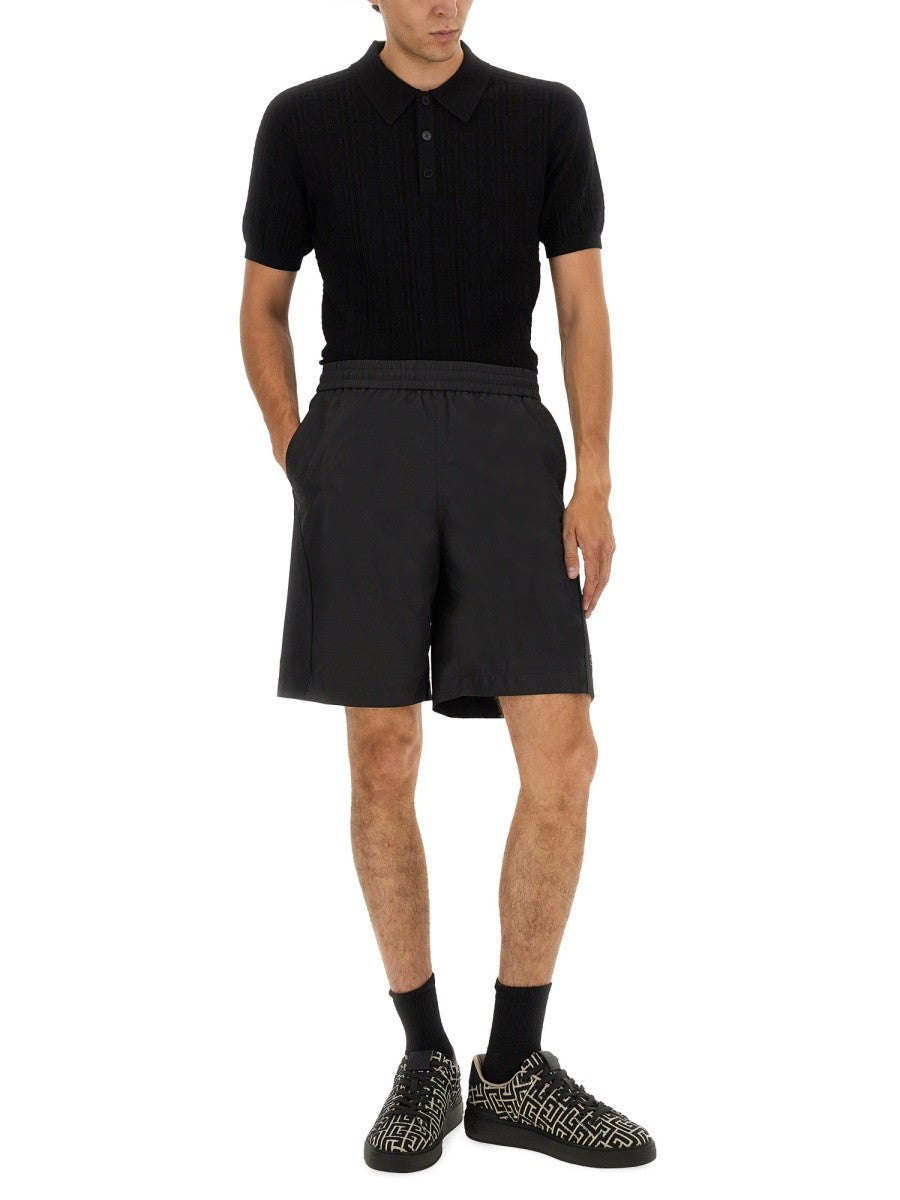 Balmain GESTRICKTES POLOSHIRT.