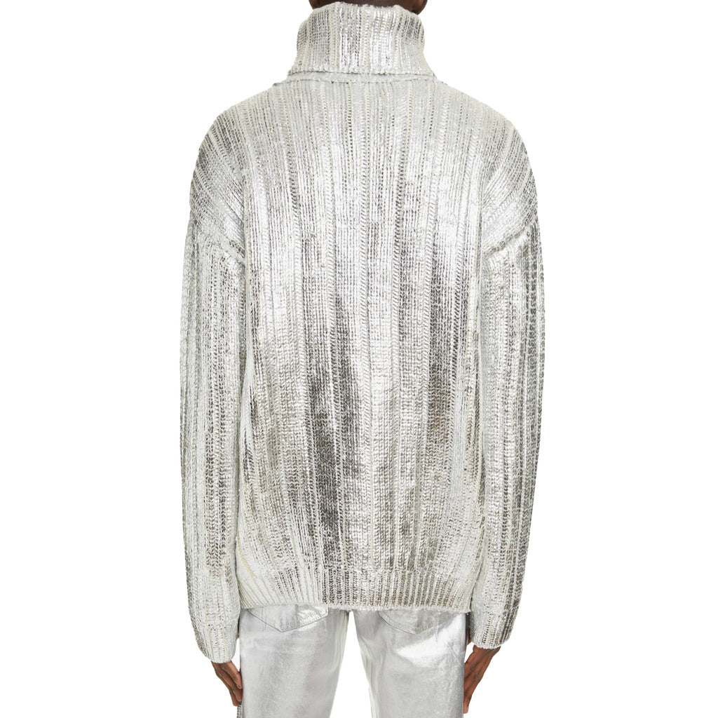 Close up of the silver metallic cable knit texture on the Balmain turtleneck sweater.