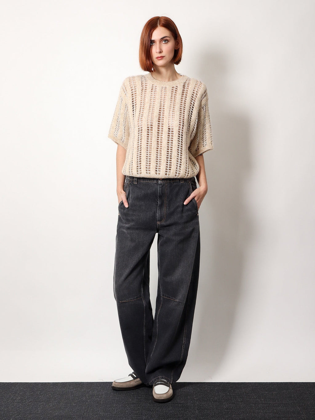 Brunello Cucinelli Black denim trouser with leather logo tag