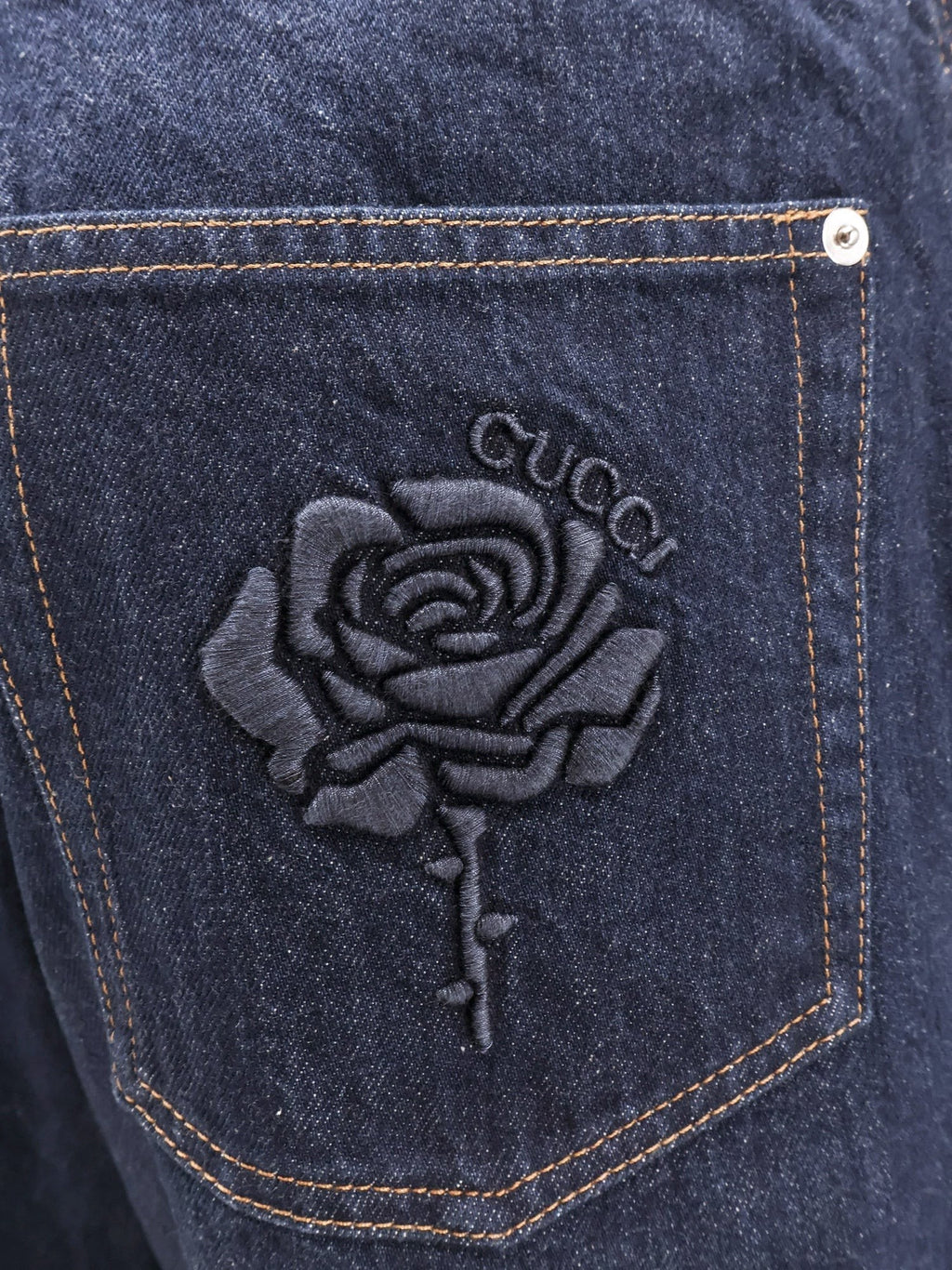 Gucci Medvilniniai džinsai su gėlių raštu gale