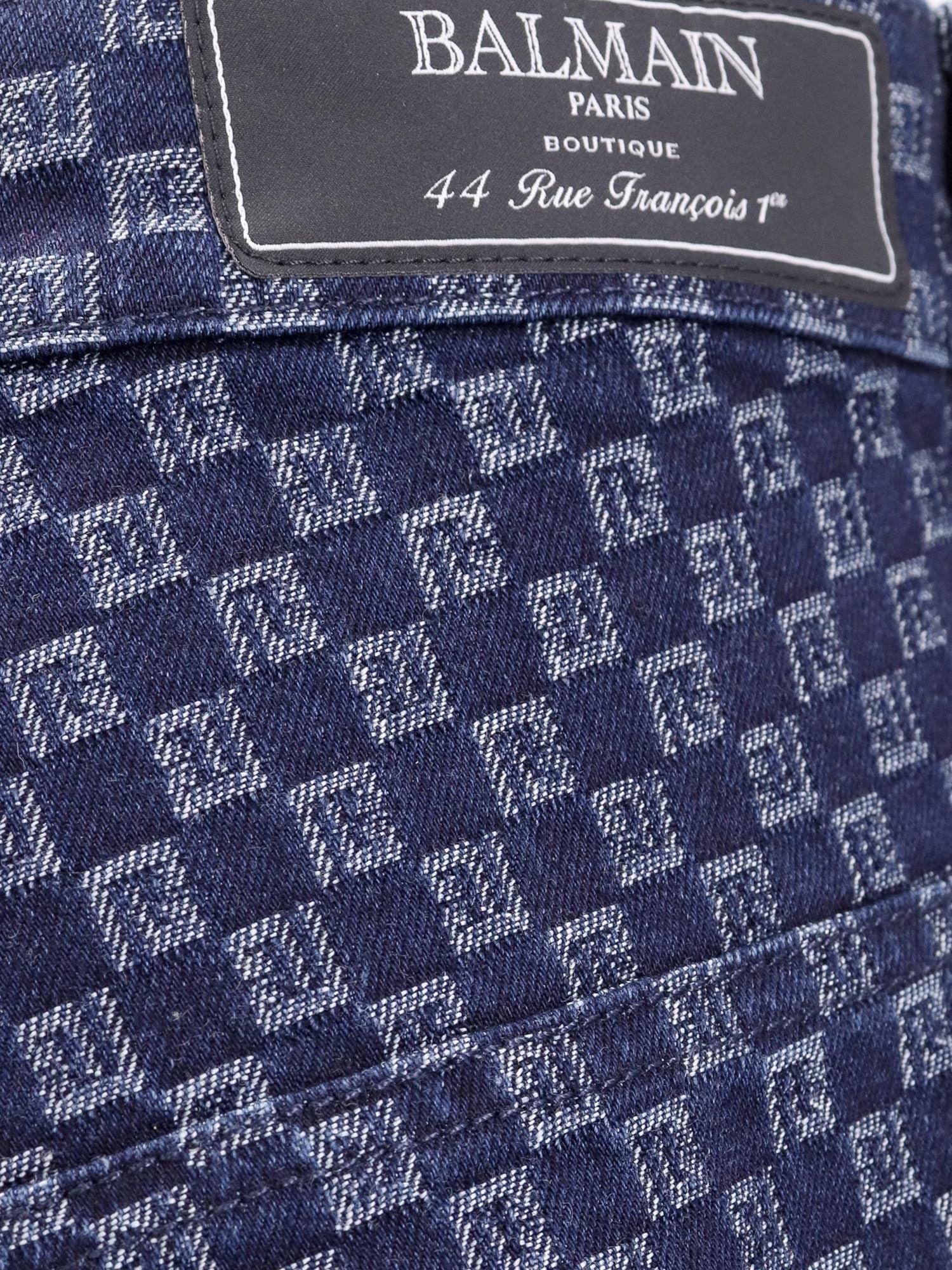 Balmain Jeans i løs passform av bomull med heldekkende monogram