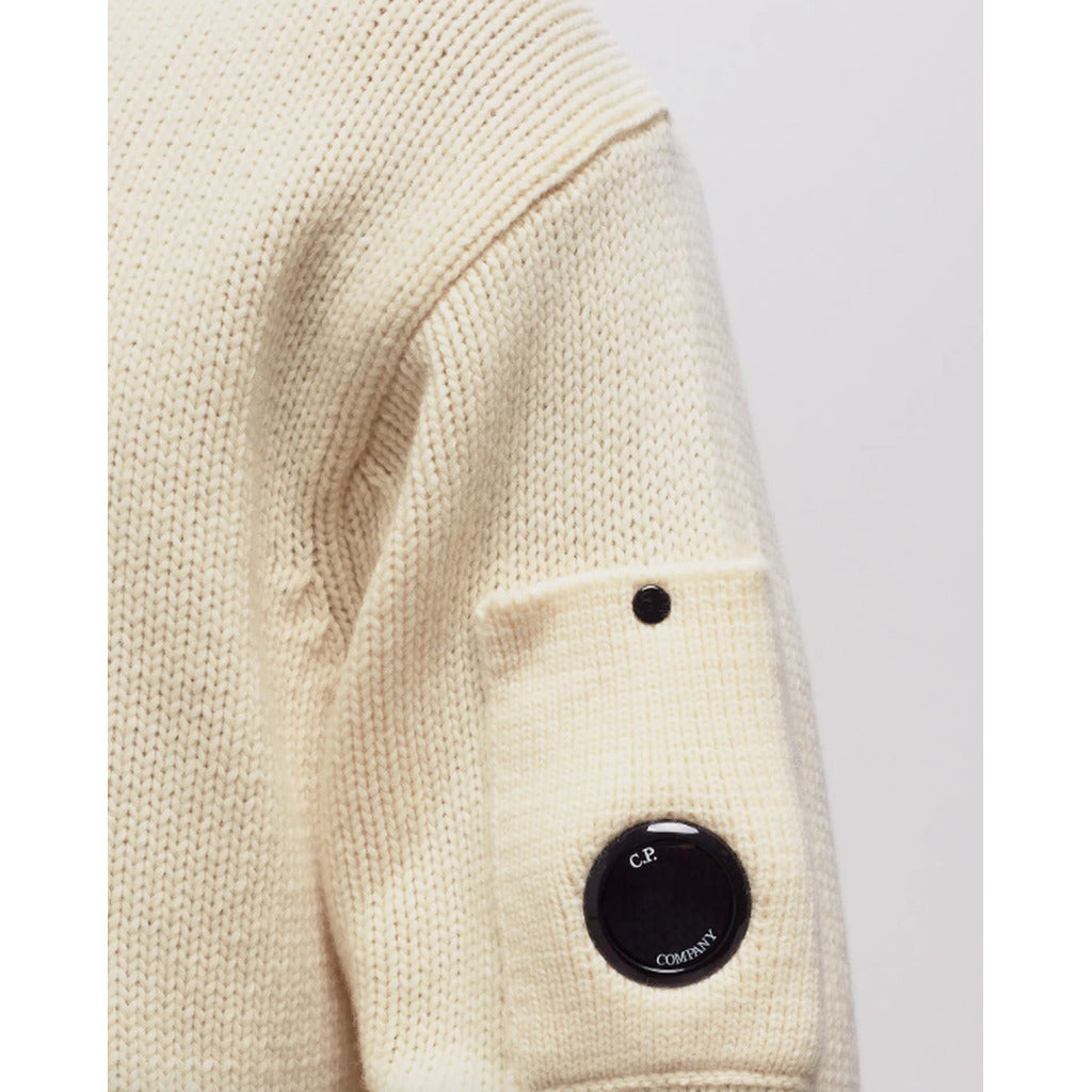 CP Company cream white knitwear jumper highlighting the iconic goggle feature.
