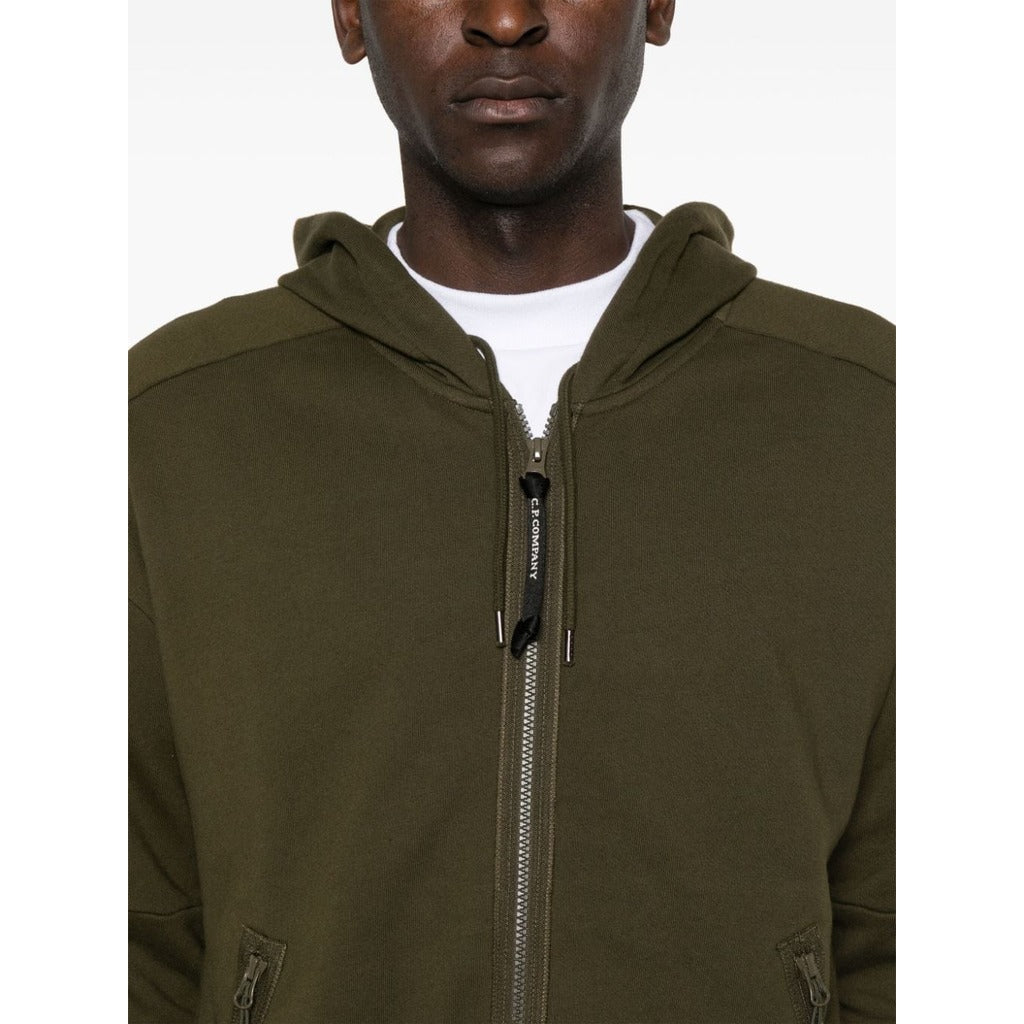 CP Company green goggle zip hoodie highlighting the front zip fastening.
