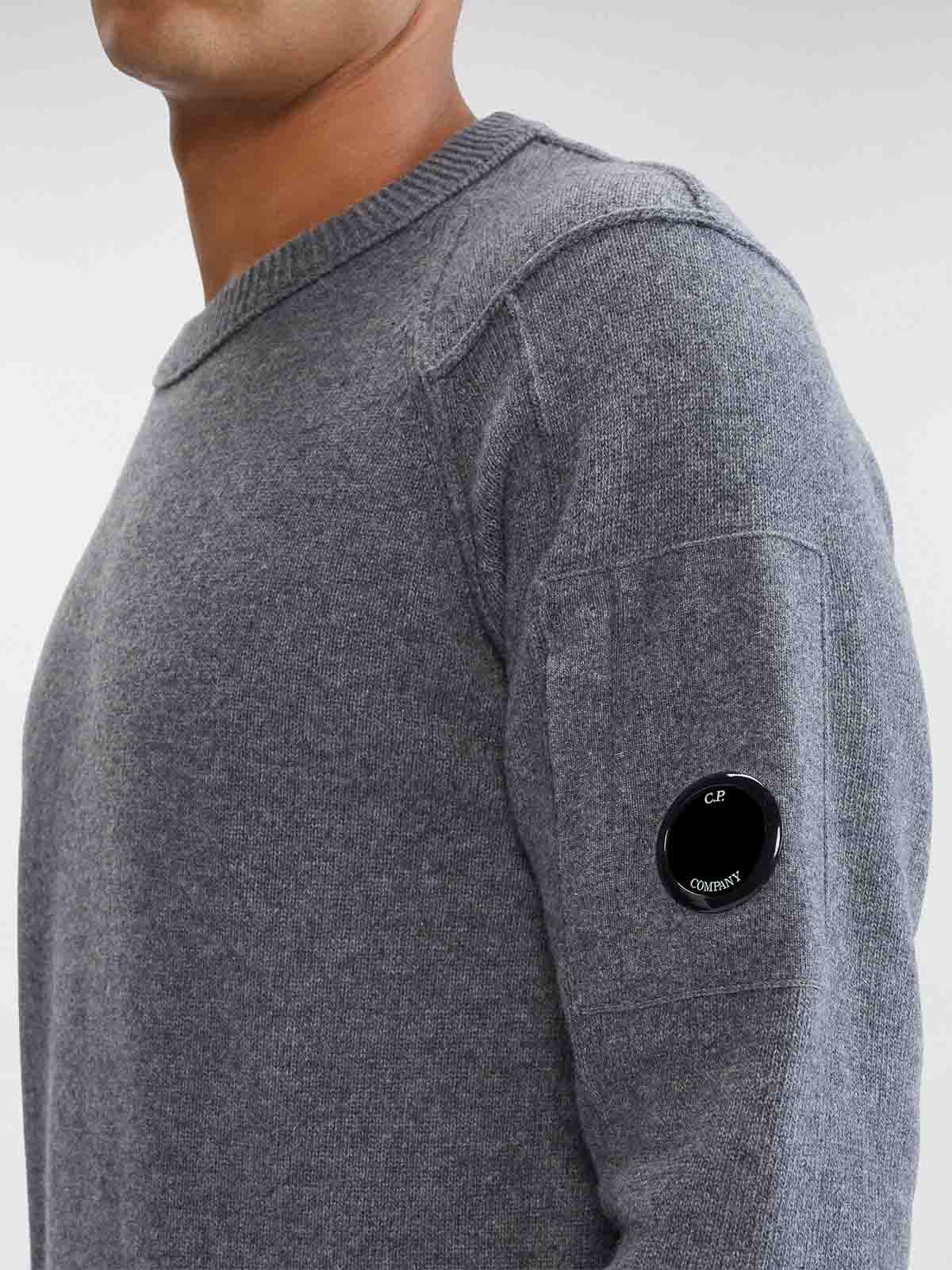 View of the crew neck and side zip goggle pocket on the CP Company grey wool blend sweater.