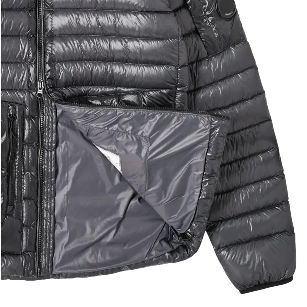 Close-up of the resistant nylon micro-ripstop fabric on the CP Company grey down jacket.

