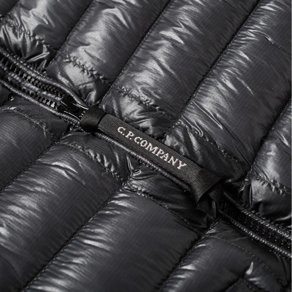 Detail of the zip fastening on the CP Company grey micro-ripstop down outerwear.
