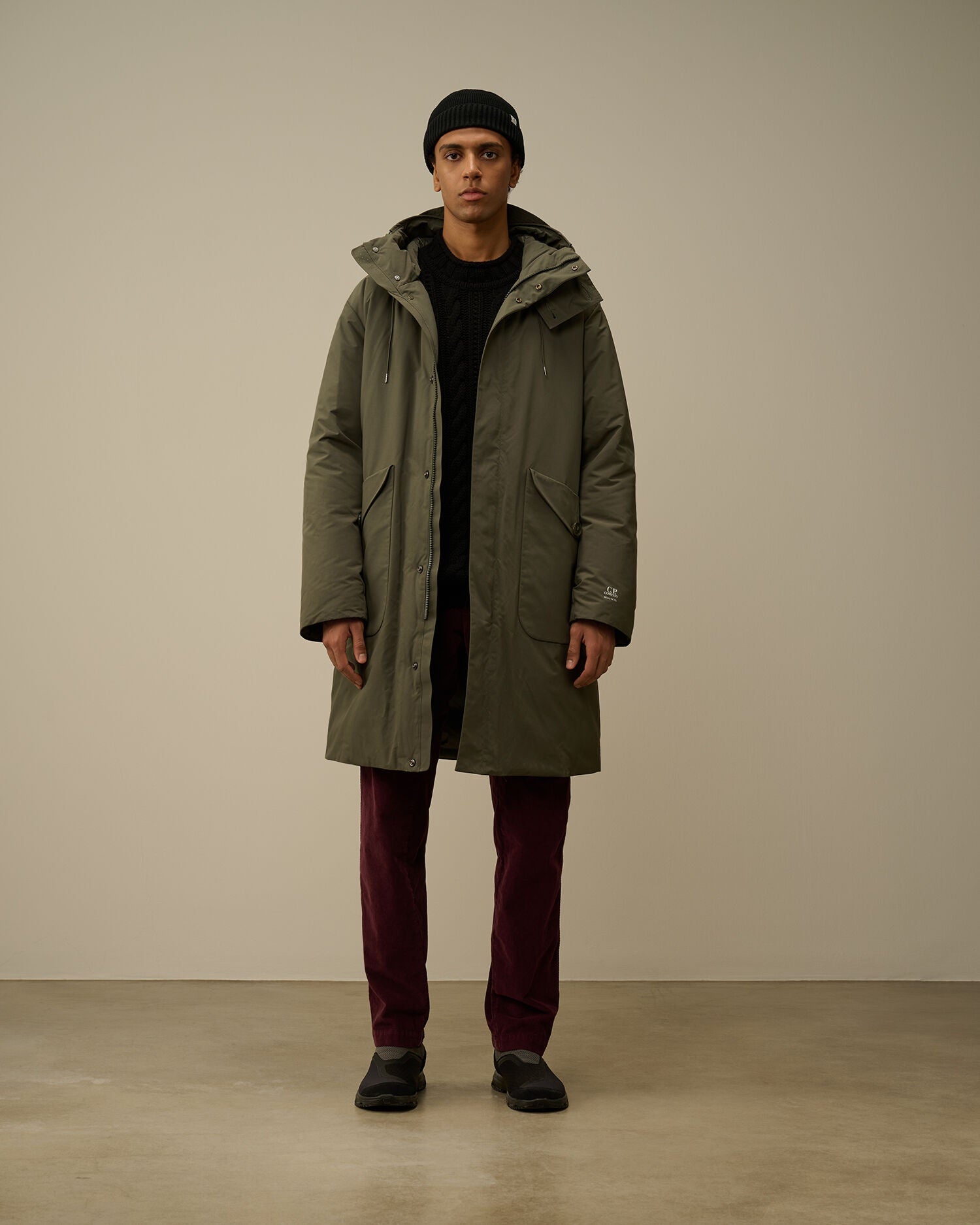 CP Company Micro-M (R) down parka in green, front view on model