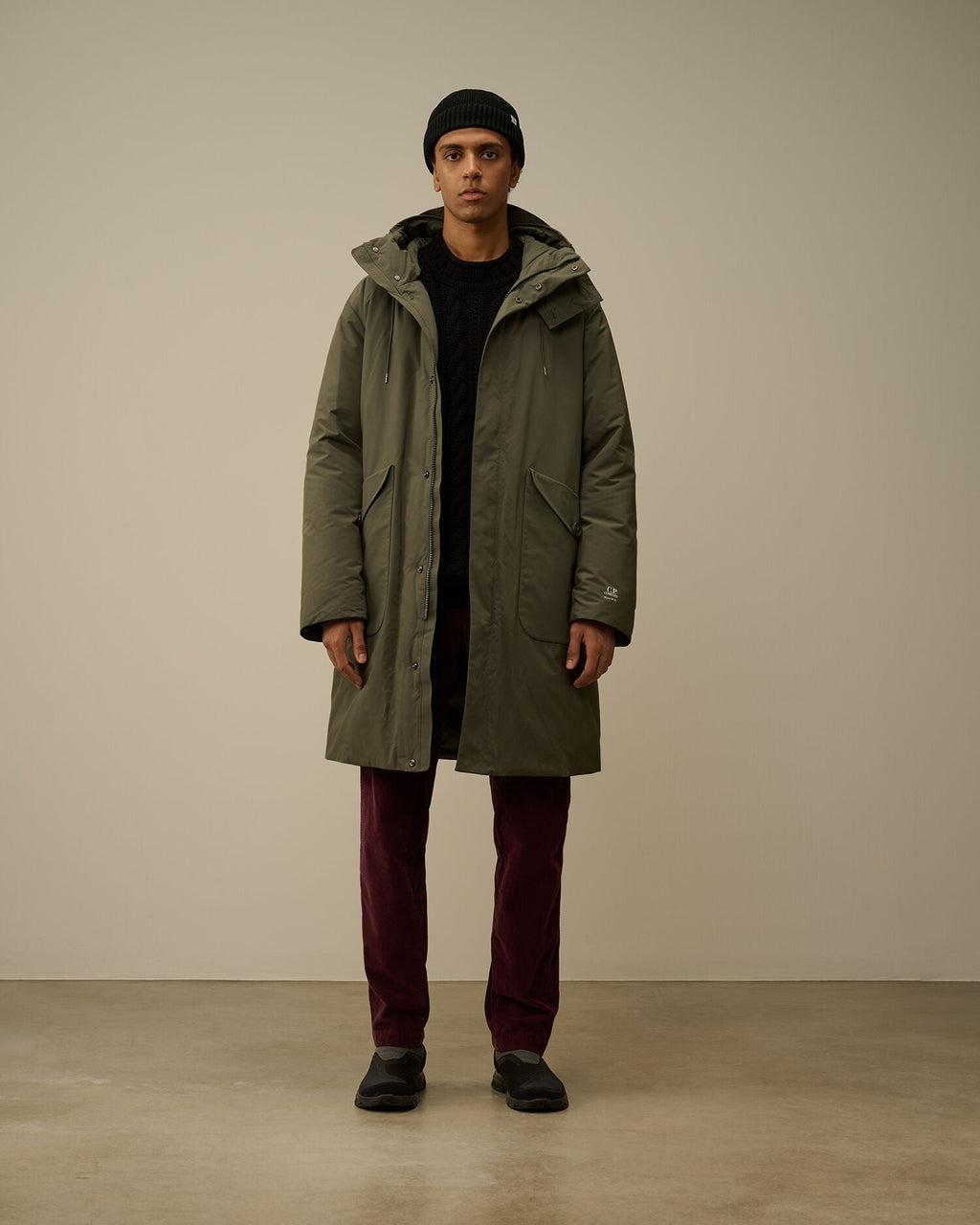 CP Company Micro-M (R) down parka in green, front view on model