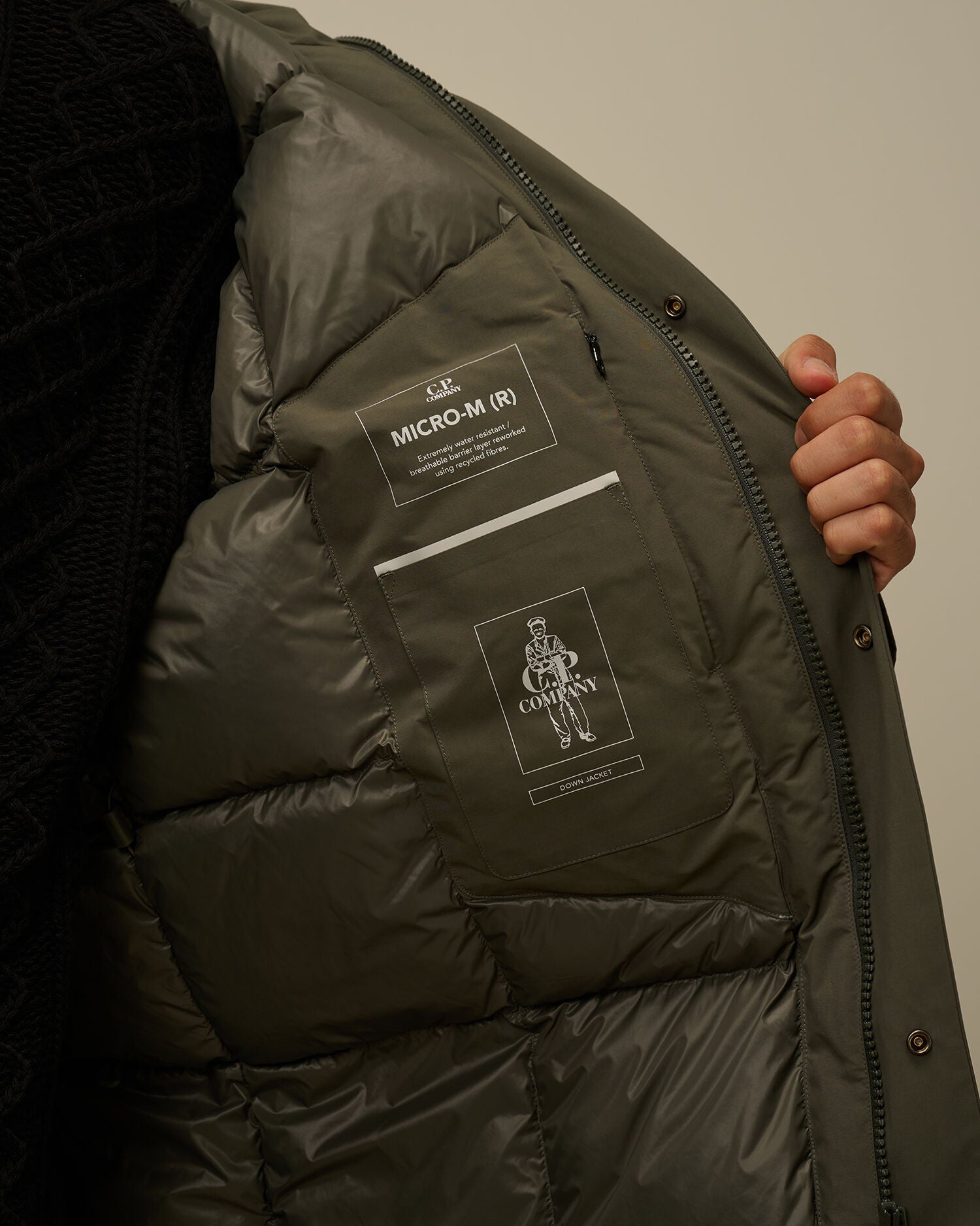 CP Company Micro-M (R) down parka in green, inside view