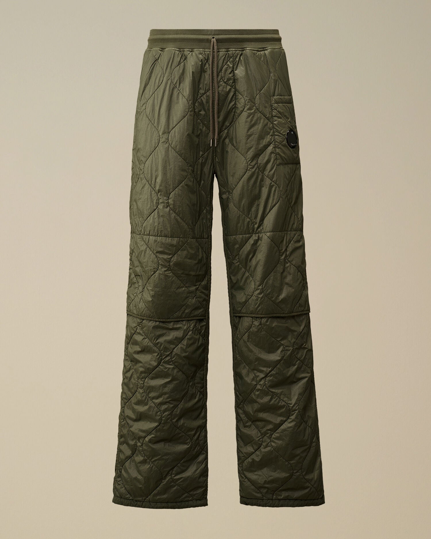 CP Company camo green quilted straight sweatpants, front view with drawstring.
