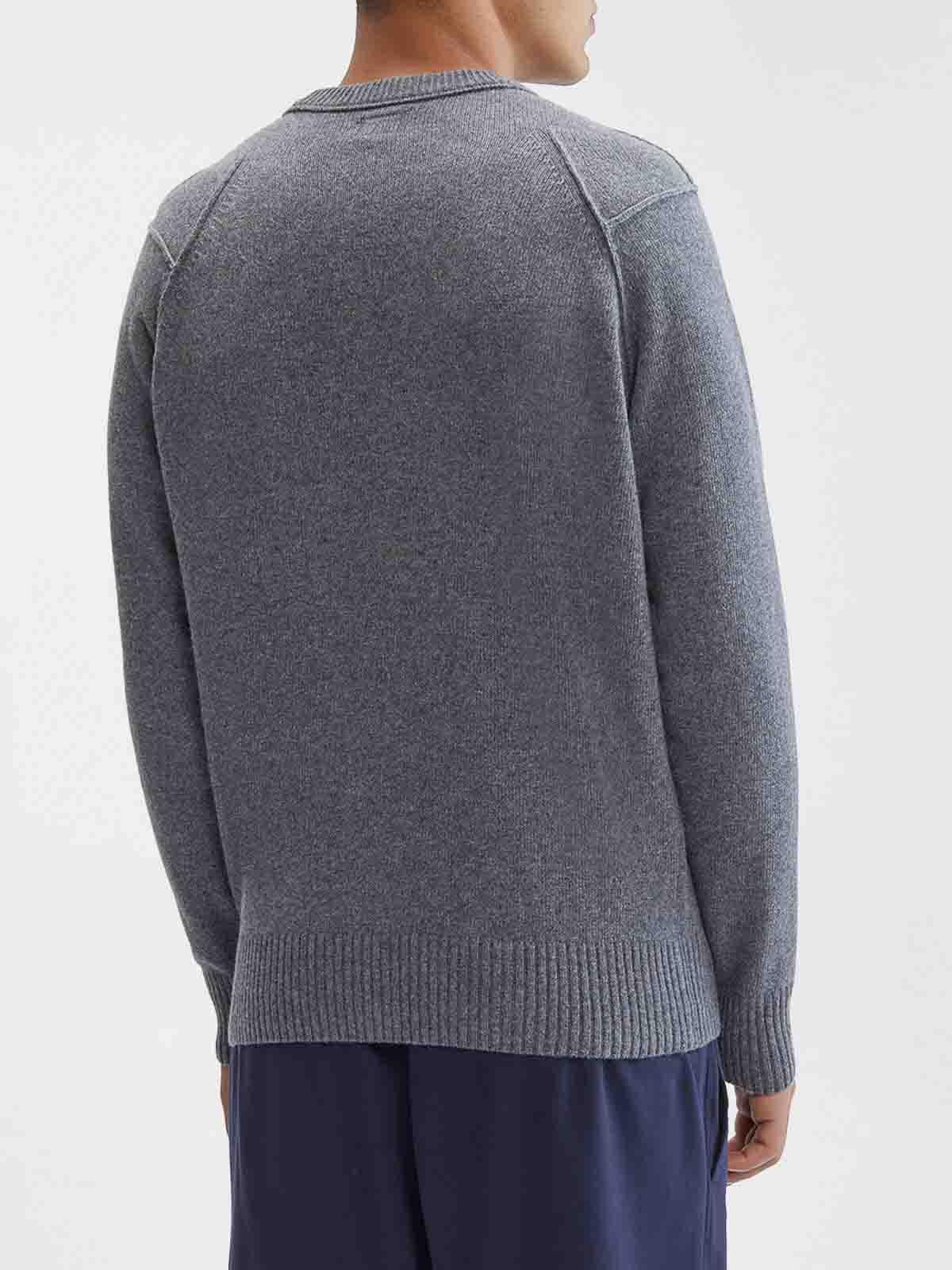 Back view of the CP Company grey wool blend goggle pocket cardigan sweater.
