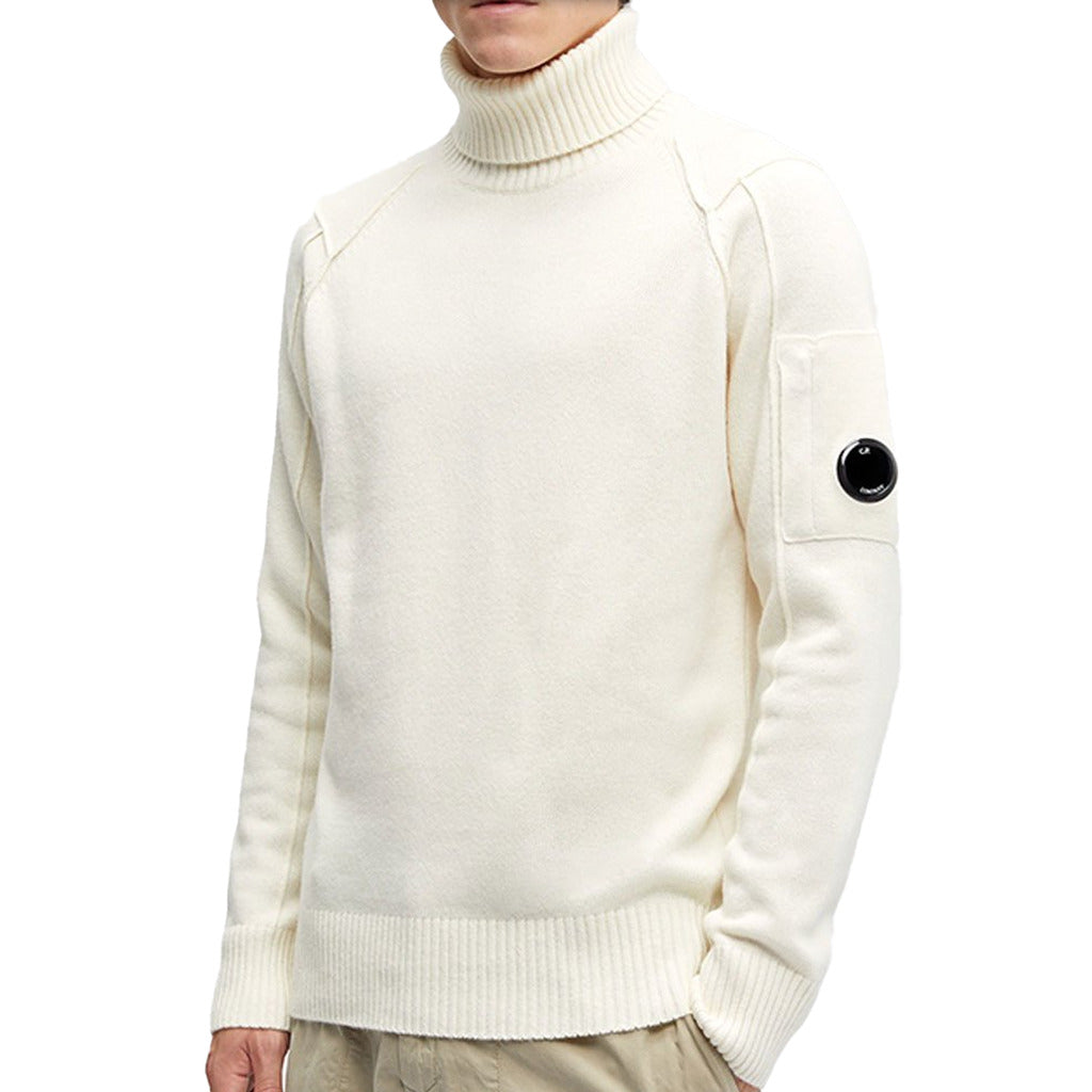 CP Company white wool knit turtleneck sweater, front view.
