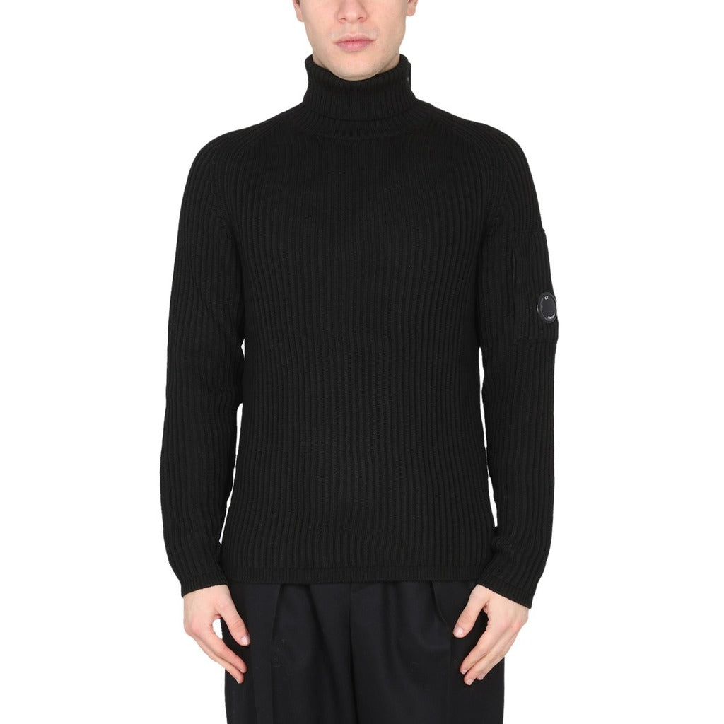 CP Company black wool blend turtleneck sweater with side goggle pocket, front view.