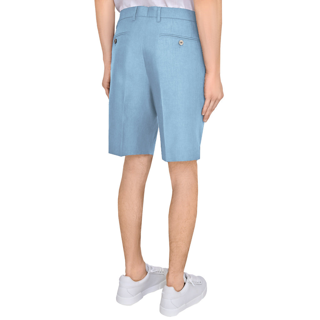 Back view of Dolce & Gabbana blue linen shorts showing buttoned pockets and pleat detail
