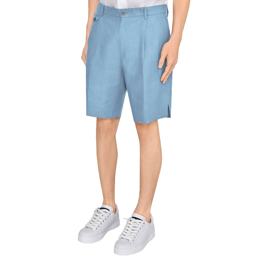 Model wearing the Dolce & Gabbana blue pleated linen shorts, styled look
