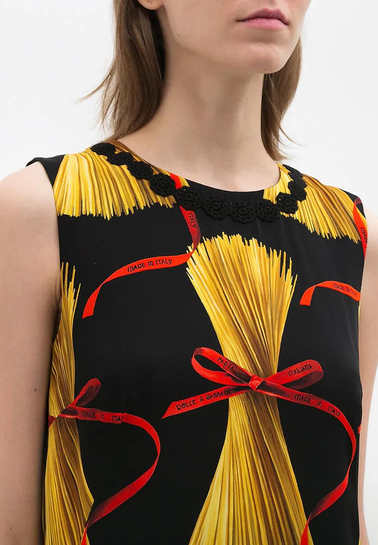 Close-up of the unique spaghetti pasta print on Dolce & Gabbana silk blend dress
