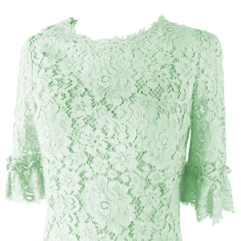 Detail of the embroidered floral tulle on the Dolce & Gabbana green cocktail dress