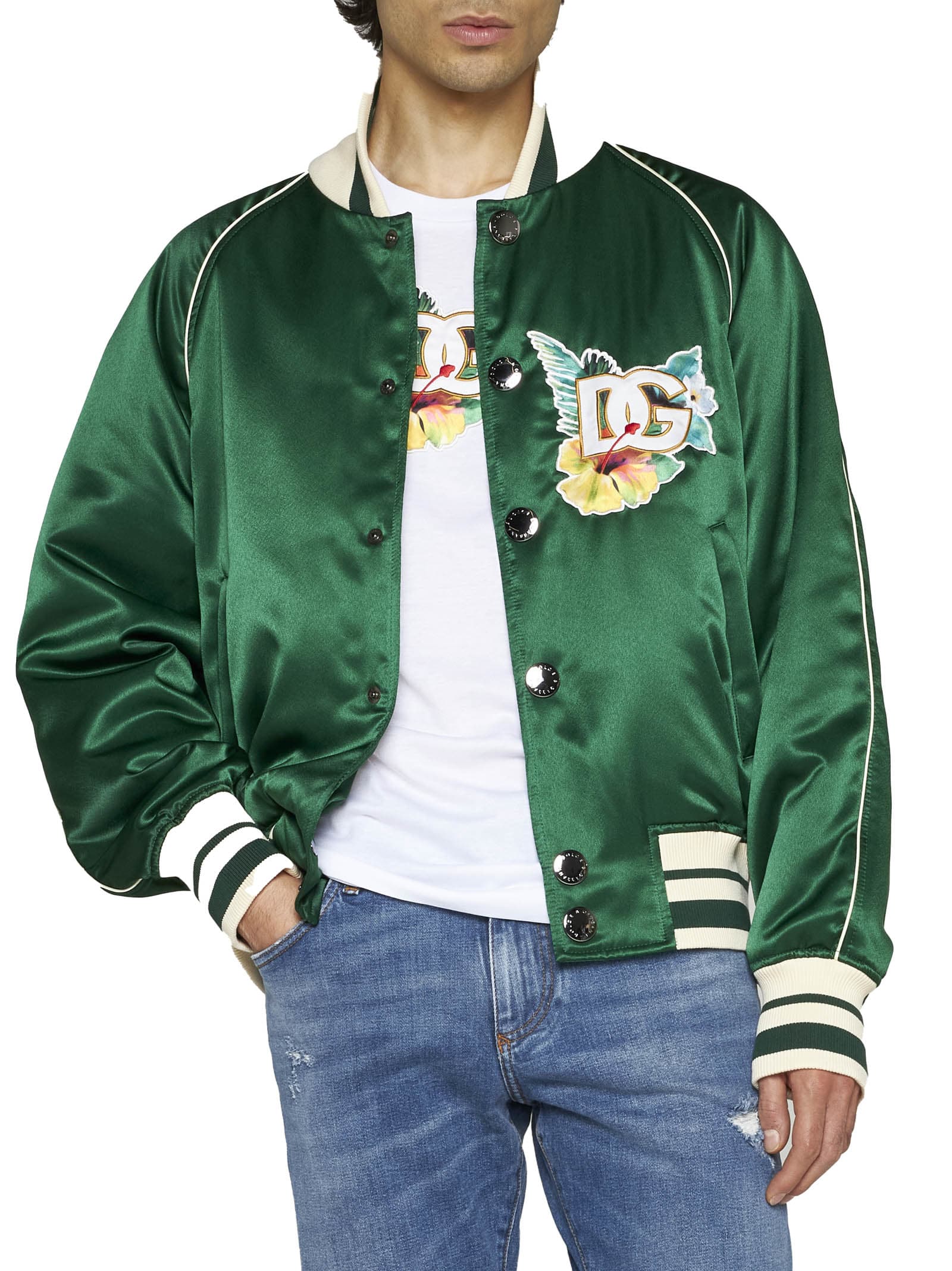 Model wearing the Dolce & Gabbana green floral logo-print satin bomber jacket