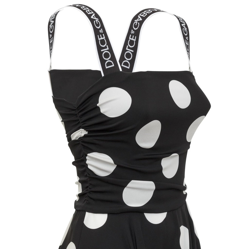 Straight neckline detail of the Dolce & Gabbana black polka dot dress
