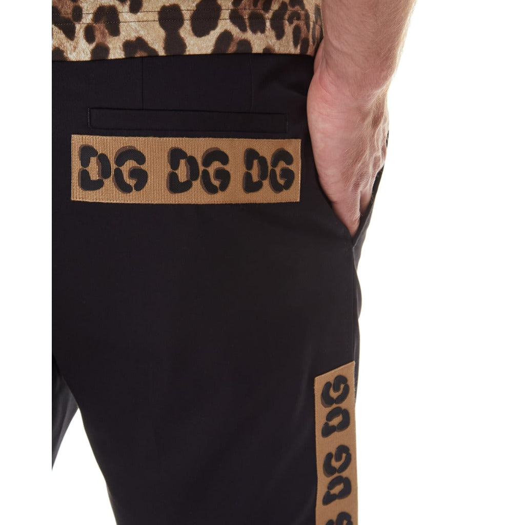 Side welt pocket and back pocket detail on Dolce & Gabbana black cotton shorts