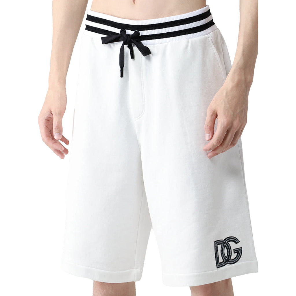 Dolce & Gabbana white cotton Bermuda shorts with black striped waistband front view on model