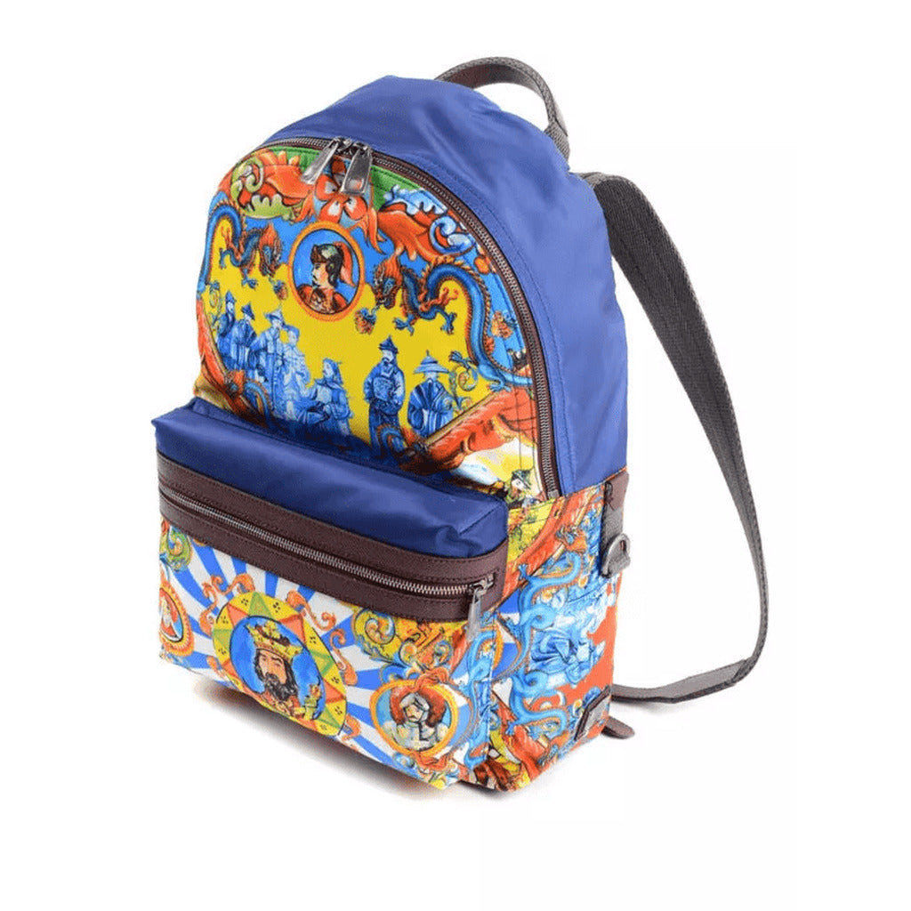 Side profile of the Dolce & Gabbana blue and patterned Sicily Fantasy backpack
