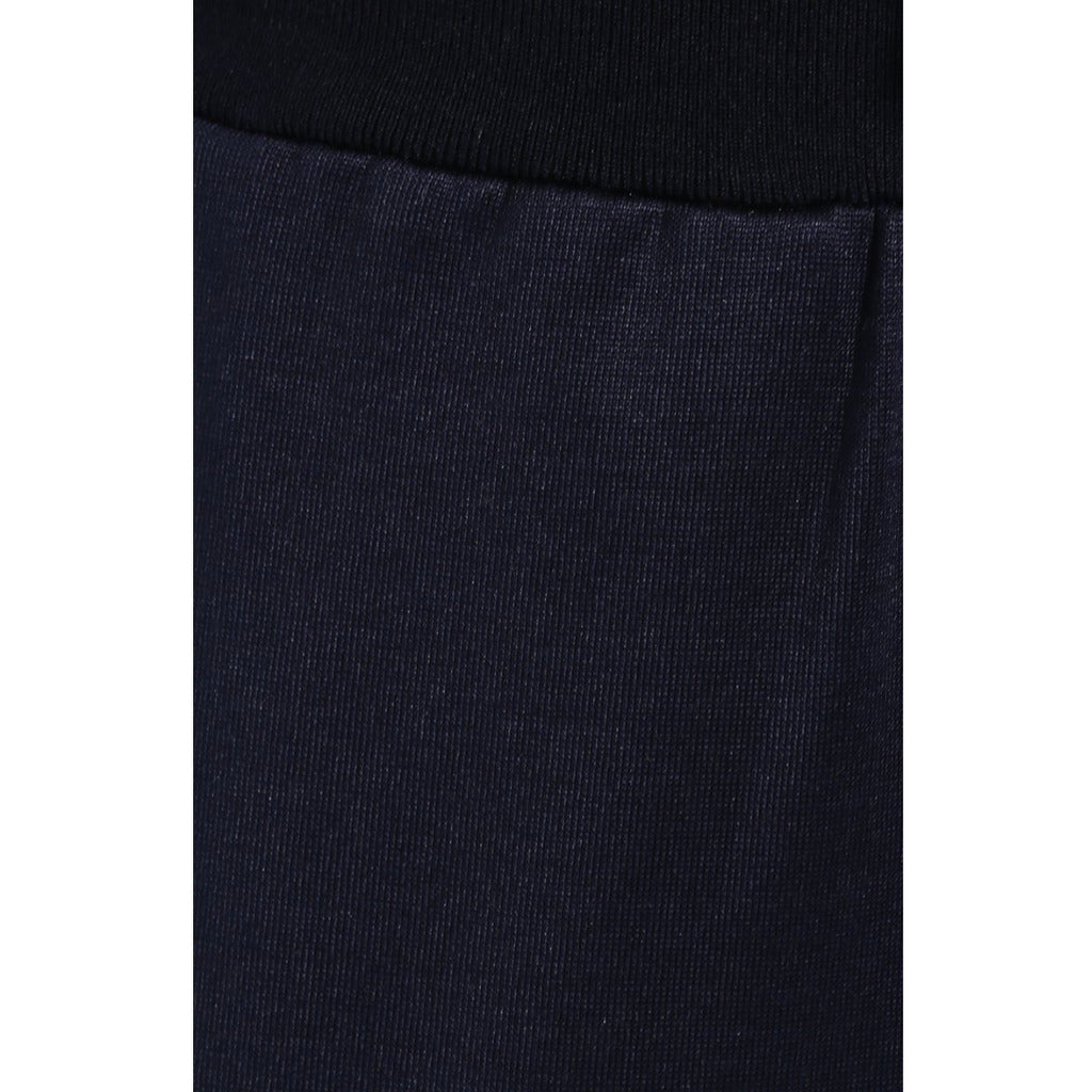 Texture of the blue silk and cotton blend fabric on Dolce & Gabbana trousers