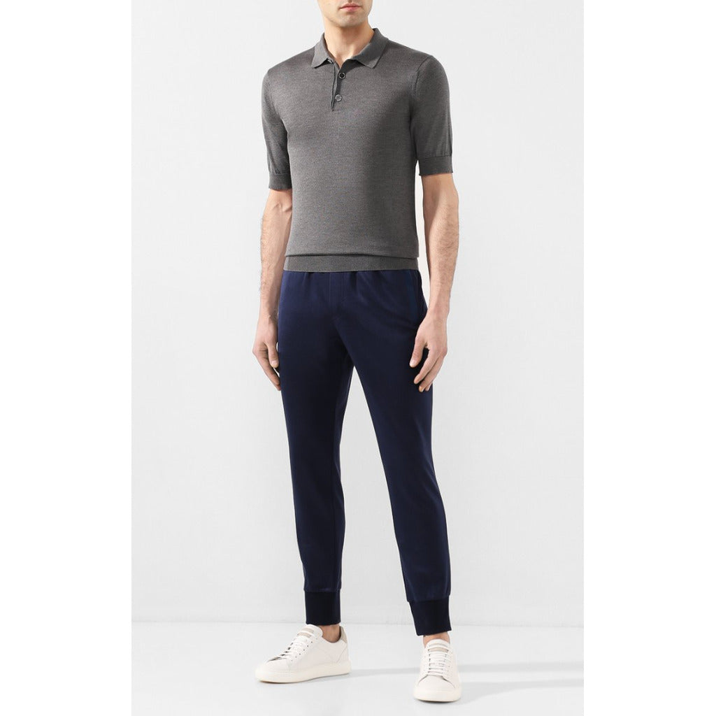 Dolce & Gabbana blue silk cotton blend logo sweatpants, front view on model