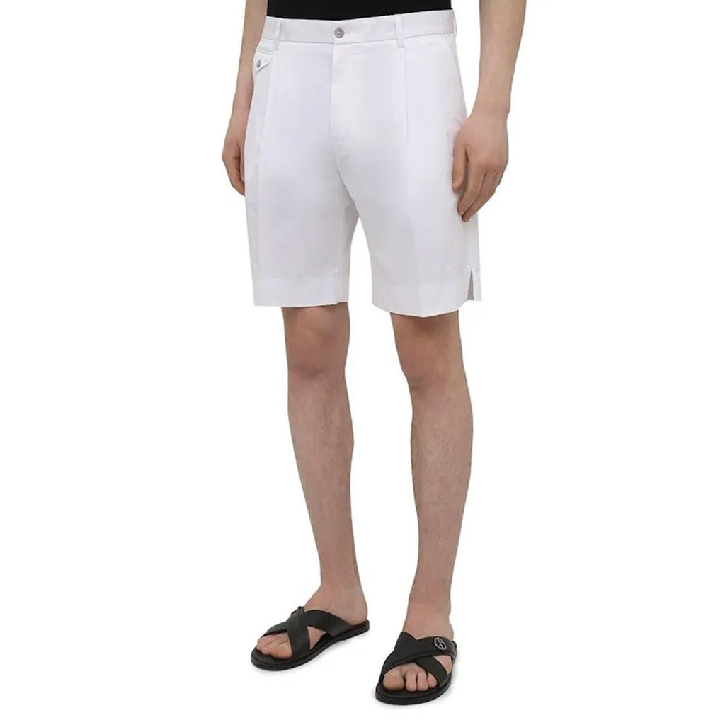 Model wearing the Dolce & Gabbana white stretch cotton chino shorts, styled look