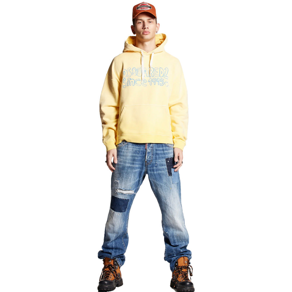 Dsquared2 Cool Guy blue jeans with black patches and paint splatter styled
