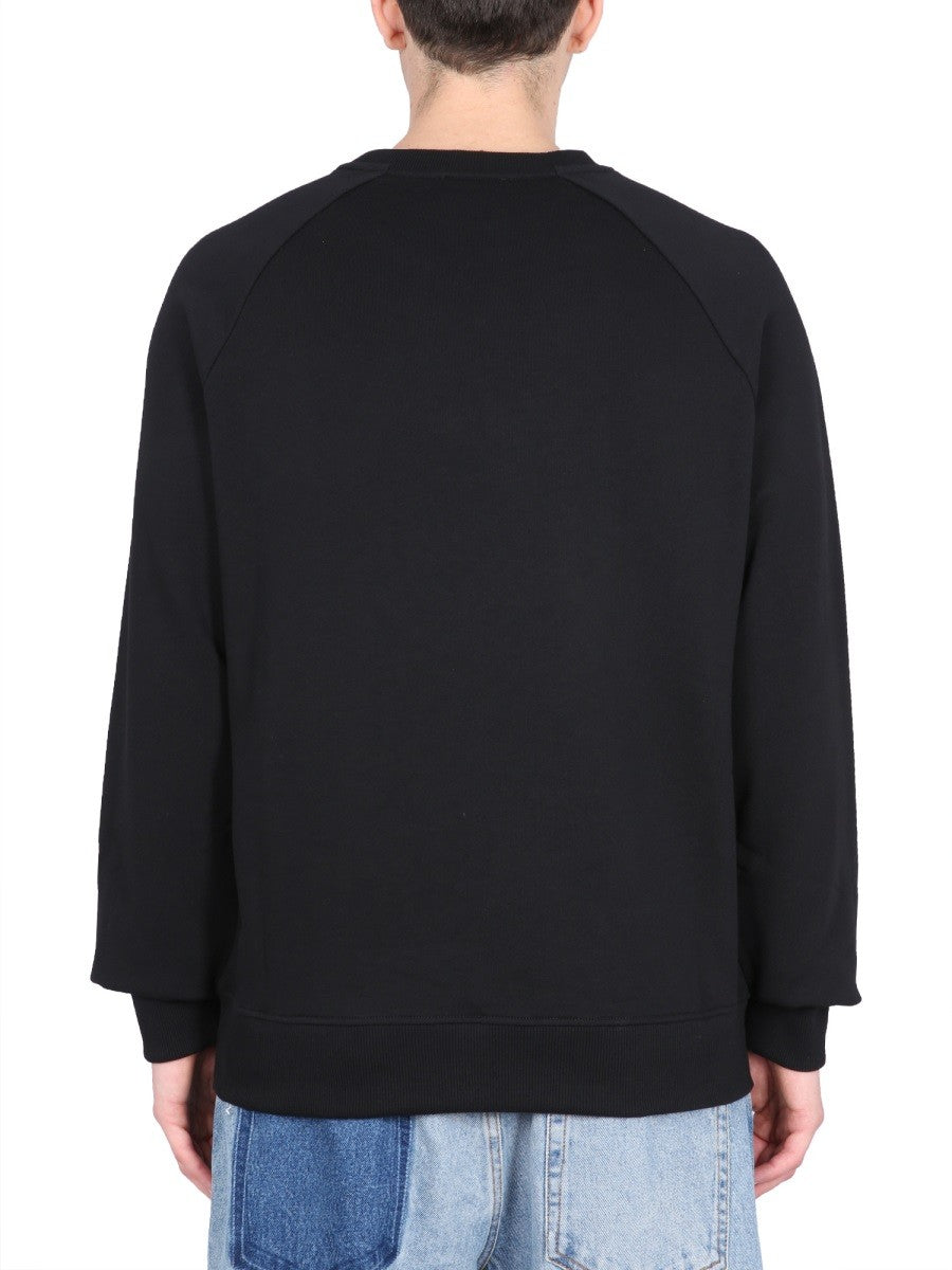 Balmain collegegenser med flokket og metallisk logo