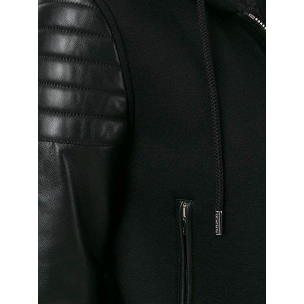 Close-up of the lambskin leather inserts on the Givenchy black viscose jacket
