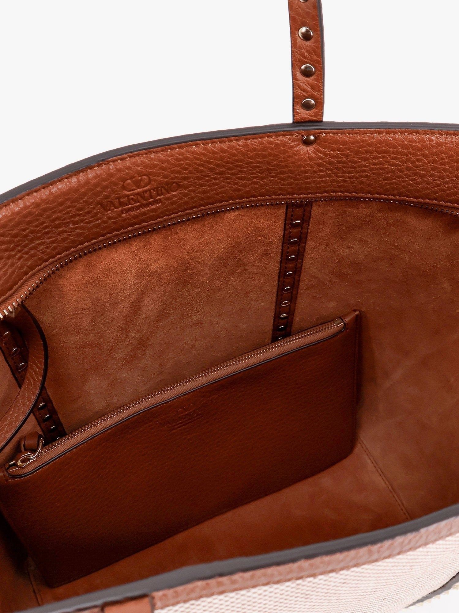 Valentino Garavani Leather and canvas shoulder bag with iconic studs