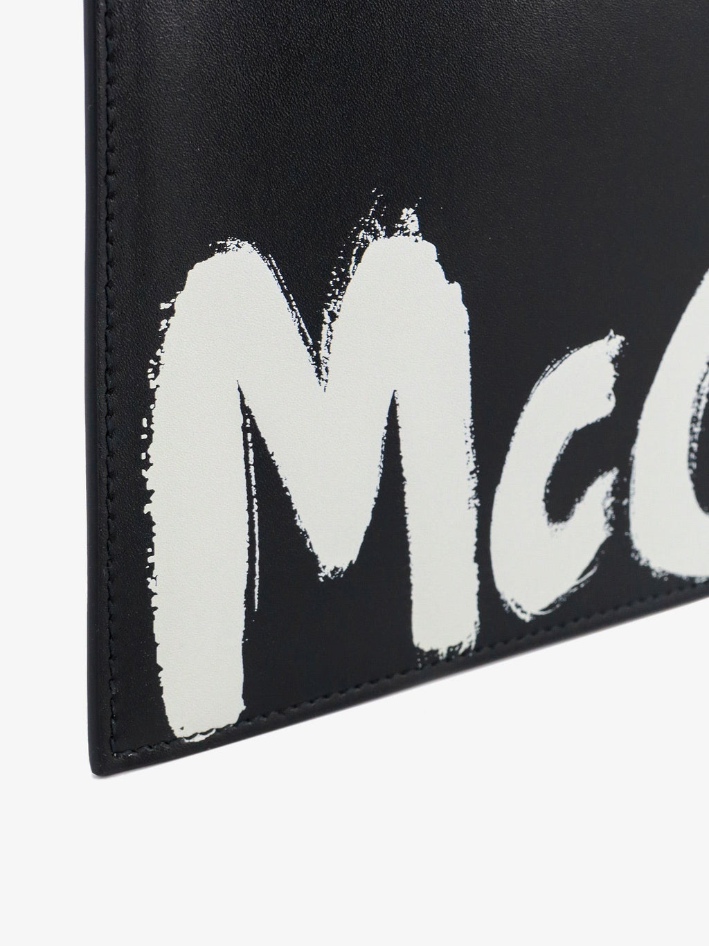 Alexander Mcqueen Odinis delninukas su mcqueen grafičių logotipu