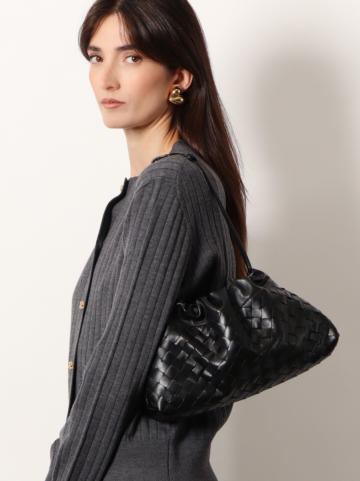Bottega Veneta Leather Dustbag clutch with Intrecciato motif