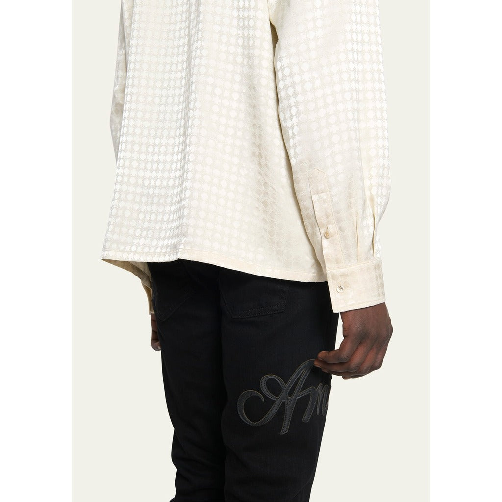 Model showcasing the normal fit of the Amiri MA Quad monogram long sleeve shirt, back view.