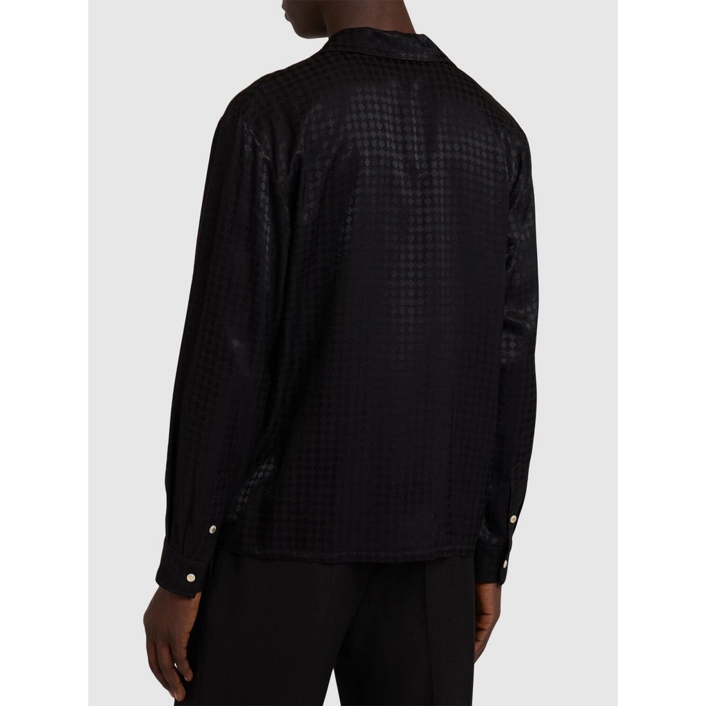 Model showcasing the regular fit of the Amiri MA Quad monogram long sleeve shirt with notched collar, back view.