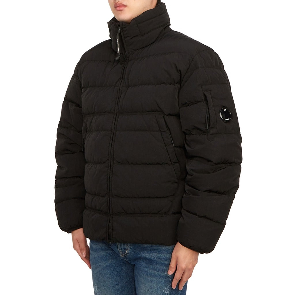 Model showcasing the fit of the CP Company Chrome-R Goggle Hood jacket.
