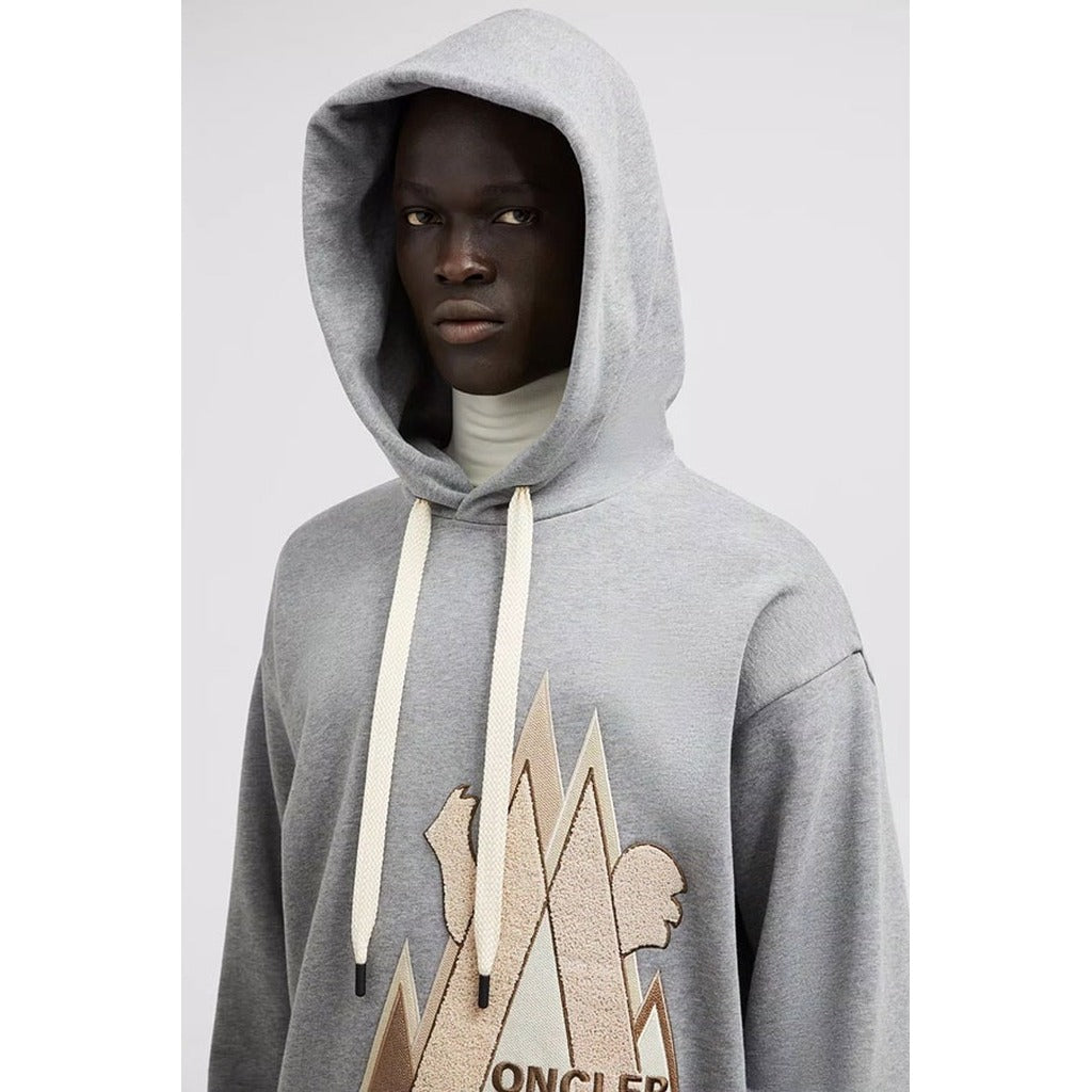 Detail of the adjustable drawstring hood on the Moncler Grenoble gray sweatshirt
