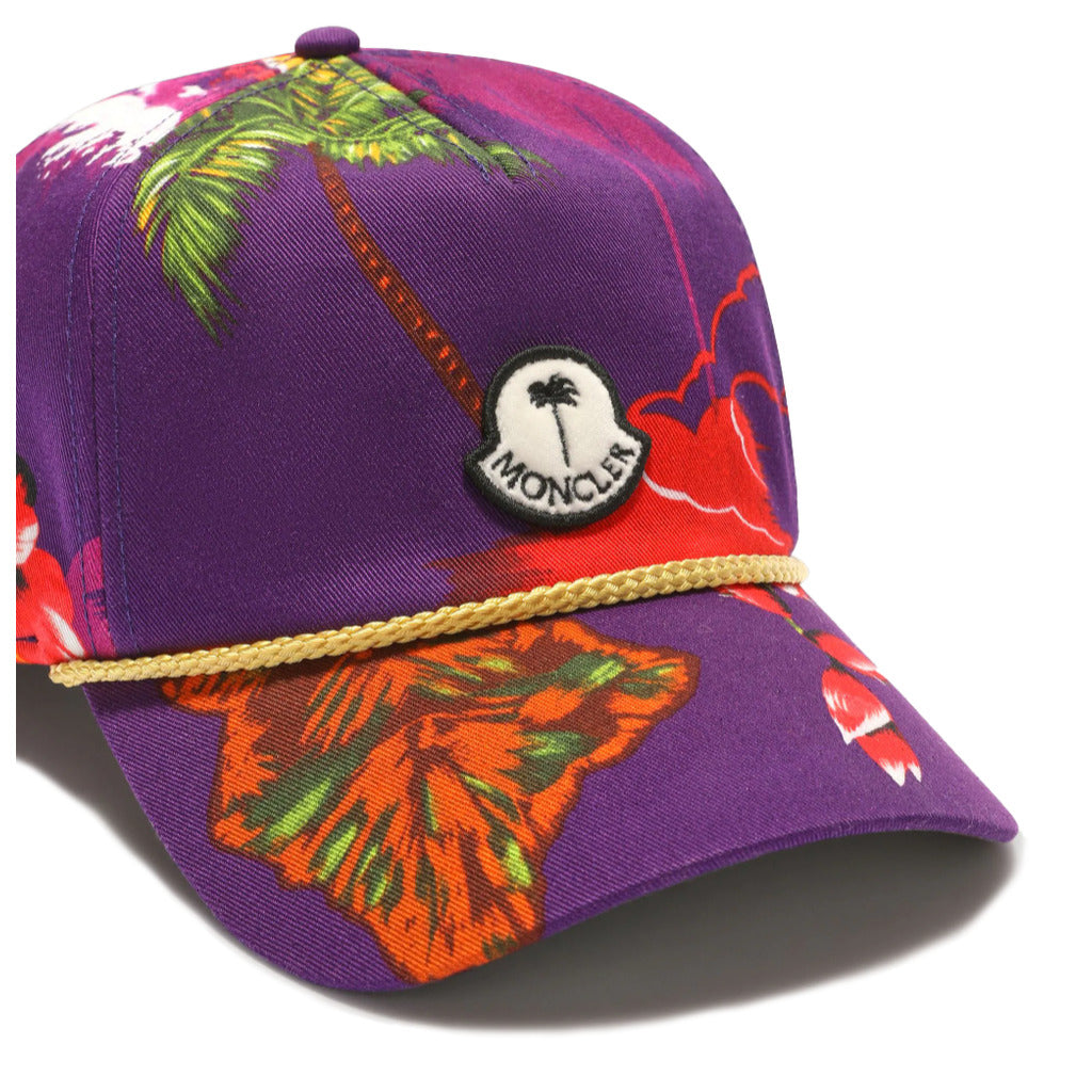 Angled view highlighting the floral print on the Moncler x Palm Angels purple baseball cap
