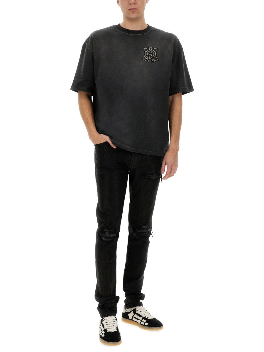Amiri „MX1 WAXED“ džinsai