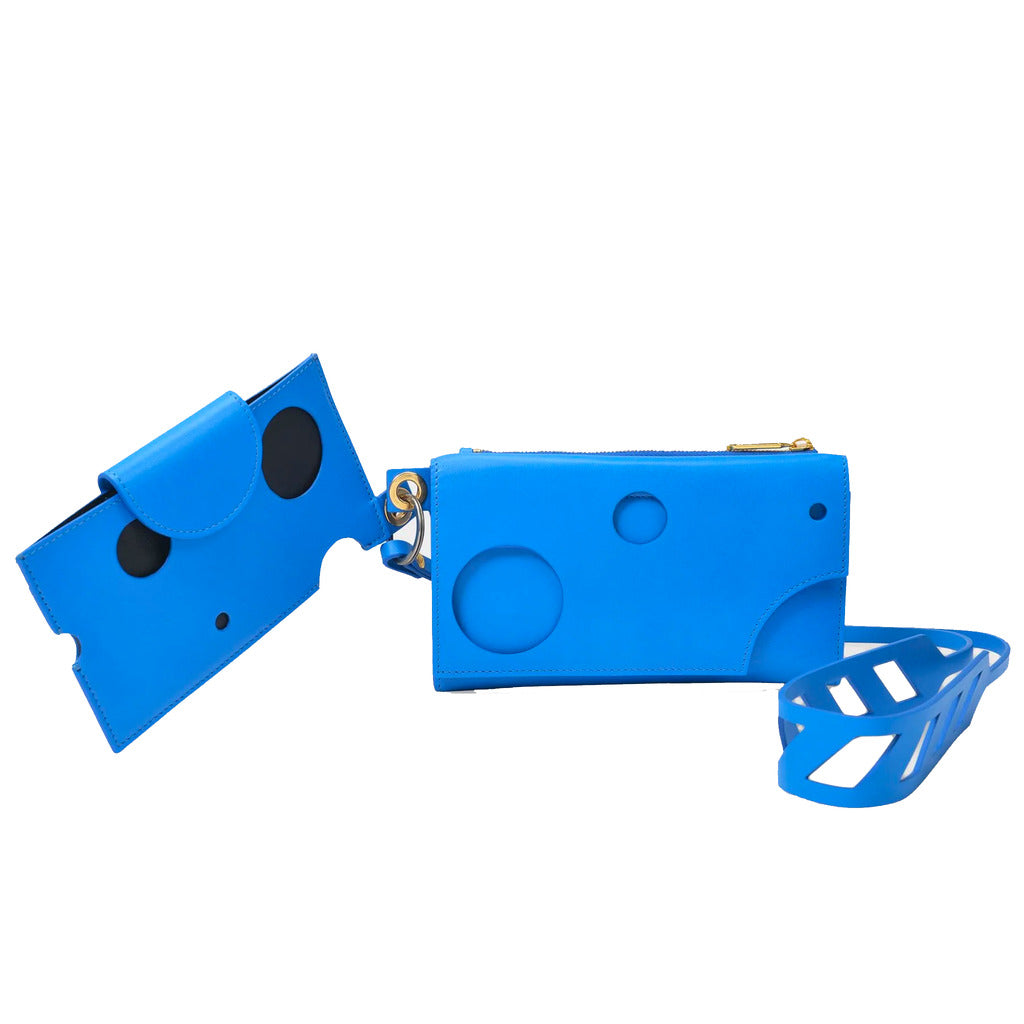 Angled view of the Off-White bright blue leather handbag