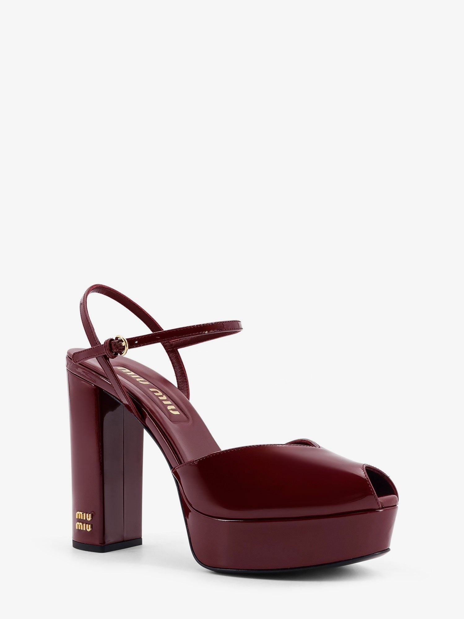 Miu Miu Patent leather sandals with heel and wedge