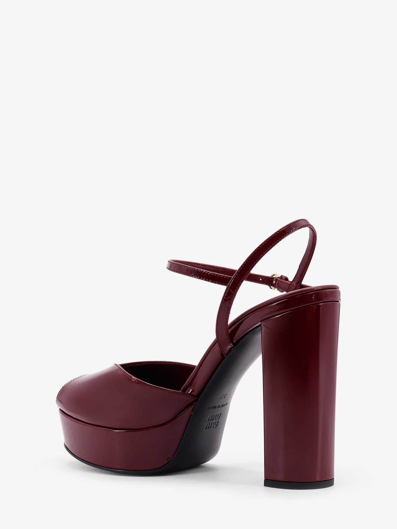 Miu Miu Patent leather sandals with heel and wedge