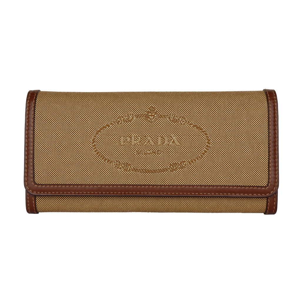 Prada flap wallet in rope and burnt brown canvas and leather.

