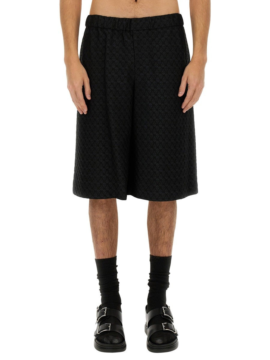 Alexander Mcqueen PANTALONI SCURȚI CU MODEL JACQUARD CRANIU