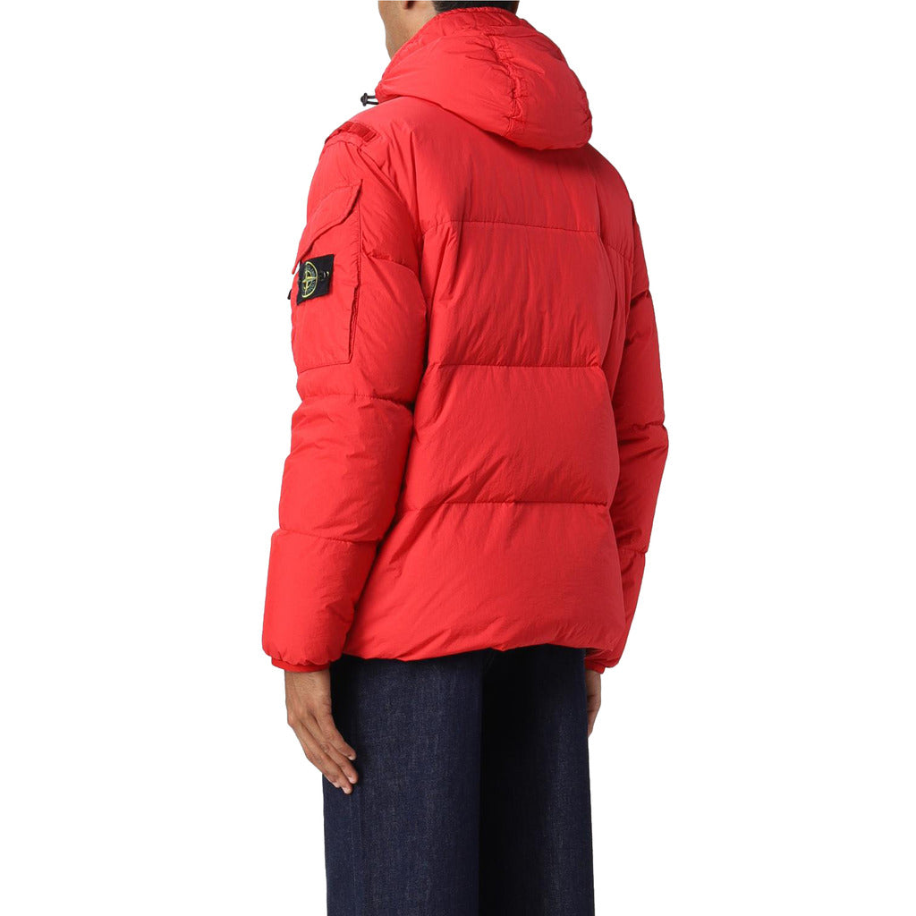 Close-up of the Stone Island badge and sleeve pocket on the red down jacket.
