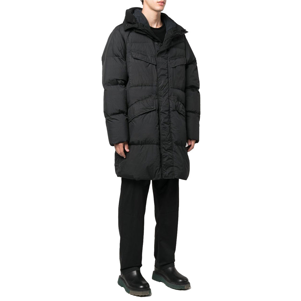 Model wearing the Stone Island Crinkle Reps Down-TC long black puffer coat.
