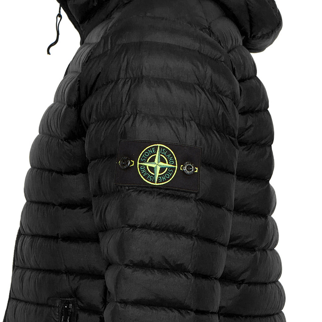 Double-slider zipper closure detail on the Stone Island black nylon jacket.
