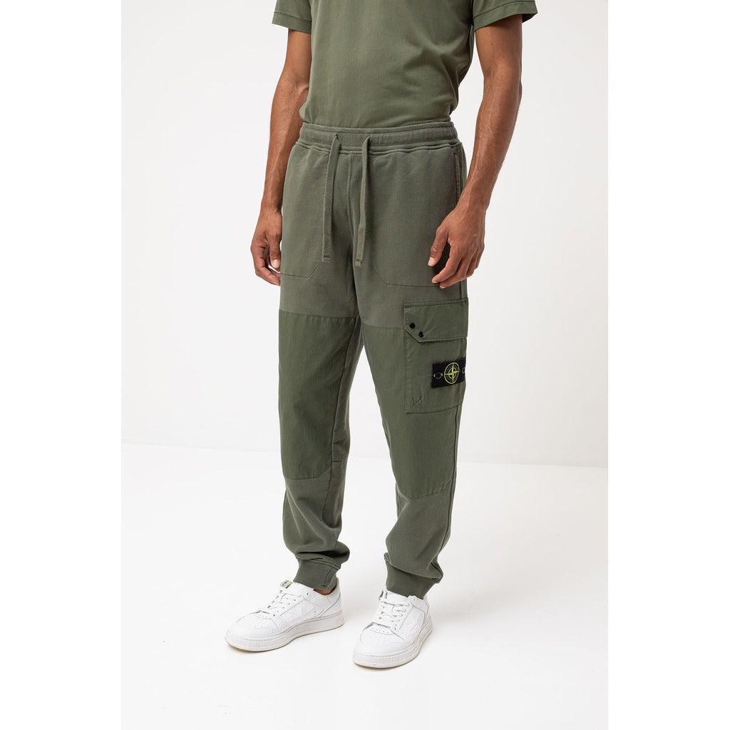 Stone Island green cotton tracksuit sweatpants, regular fit, front view.
